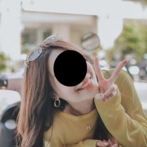 Photo of a woman showing a peace sign used by WhatsApp scammer