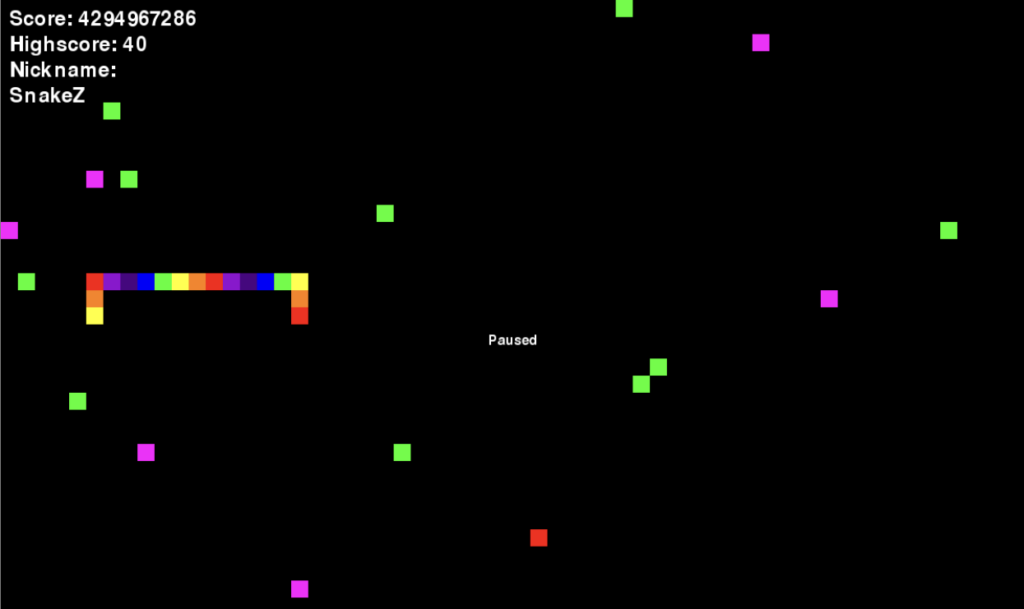 Screenshot of the snake game with a rainbow-colored snake and three types of food: green, pink, and red