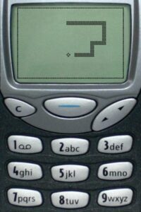 image of an old nokia mobile phone running a game of Snake