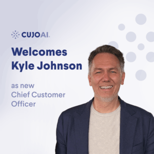 Photo of a smiling man with the text: CUJO AI Welcomes Kyle Johnson as new Chief Customer Officer